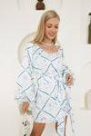 Alternate angle of Mermaid Muse kaftan showing ruched sweetheart neckline, voluminous bishop sleeves gathered at wrist, and mermaid lattice print detail